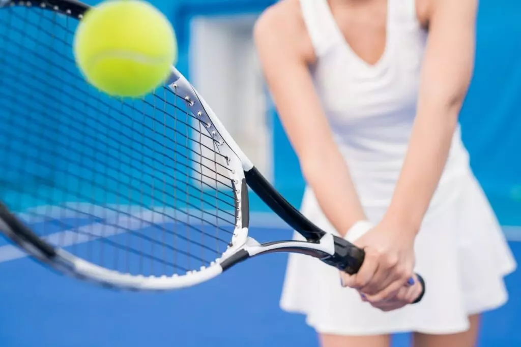 Woman playing tennis